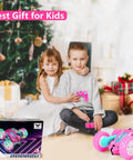 Children playing with Pink Remote Control Car For Girls That Flips 360 Degrees by Christmas tree, in a cozy room.