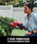 Person using V20 4 Inch Cordless Handheld Grass Trimmer And 8 Inch Mini Hedge Trimmer Kit with Battery for shrub trimming