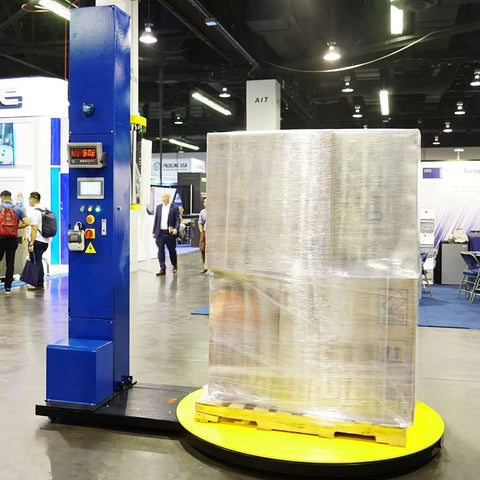 Ready To Run Automatic Stretch Wrap Machine With Loading Ramp Includes Built In Scale Weighs 5000 Pounds prints thermal labels on pallets.