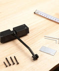 Stainless Steel Hydraulic Door Closer With No Slam Quiet Soft Close And Adjustable Spring Hinge on tabletop with tools