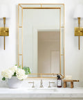 Bathroom with gold wall sconces set of 2 hardwired dimmable slick slim metal wall lighting with fabric shades next to mirror