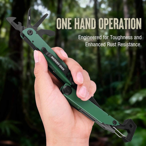 Hand holding CNC Machined Multitool Pliers 27 In 1 EDC Tool with green handle featuring knife, screwdriver, and fire starter in forest.