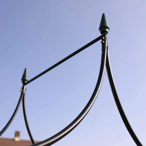 Top view of Sturdy Steel Garden Arch For Climbing Plants, 8 Ft 8 In Tall By 4 Ft 5 In Wide, showing pointed finials and weather-resistant finish.