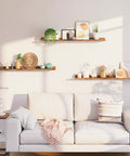 Three Piece Floating Wall Shelves Set With 47 Inch Long Ledges Raised Edge And Hidden Brackets Rustic Brown Dope Space Saver For Bathroom Kitchen Bedroom Office Living Room Decor And Display Storage installed above sofa with decor