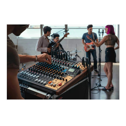 All In One 16 Track Studio Recorder And Mixer With USB Audio Interface And SD Card Recording Capabilities in use in a studio setting.