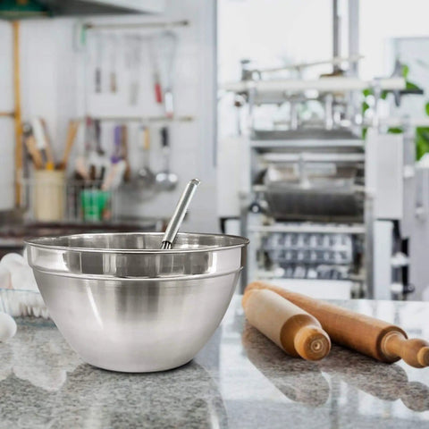 V Shaped Stainless Steel Mixing Bowl, 3 Quart Capacity, Deep Bowl Design To Cut Splatter, Polished Finish, on kitchen counter