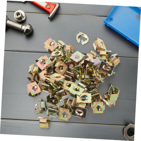 50 Piece Top Shelf Heavy Duty U Nut Fasteners Golden Captive Clips For Car Bumper And Grille Mounting arranged on a work surface.