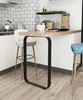 Built Tough Heavy Duty Metal Table Legs For Indoor And Commercial Spaces under a wooden countertop in a modern kitchen.