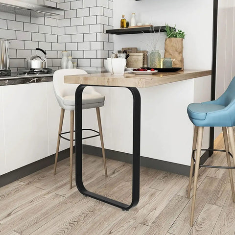 Built Tough Heavy Duty Metal Table Legs For Indoor And Commercial Spaces under a wooden countertop in a modern kitchen.