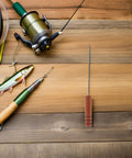 3-Piece Stainless Steel Baiting Needle Rigging Tool Set With Comfortable Rosewood Grip For Carp And Saltwater Fishing Effortless Worm Threading Precise Baiting And Versatile Lure Needle For Quick Rigging. stainless steel needle with rosewood handle on wooden surface