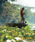 Person fishing on boat with Edge Bow Mount Electric Trolling Motor With Foot Pedal Control For Freshwater Boats 70 lb Thrust