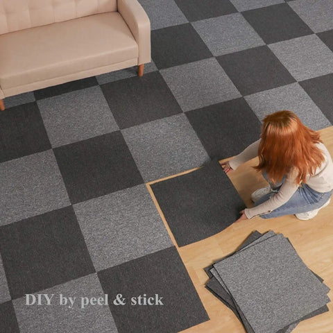 Person installing Heavy Duty 20x20 Inch Carpet Tile Squares Pack for Home Office Hotel Tough As Nails Durable Commercial Floor Tiles