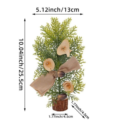 Small single artificial tree with mushrooms, nuts, ribbon; part of Three Piece Tabletop Christmas Tree Set Ready To Display Mini Artificial Xmas Trees Nine Point Eight Four Inches Tall With Red Berries Pinecones Nuts And Bows For A Cozy Desk Fireplace Holiday Decor.