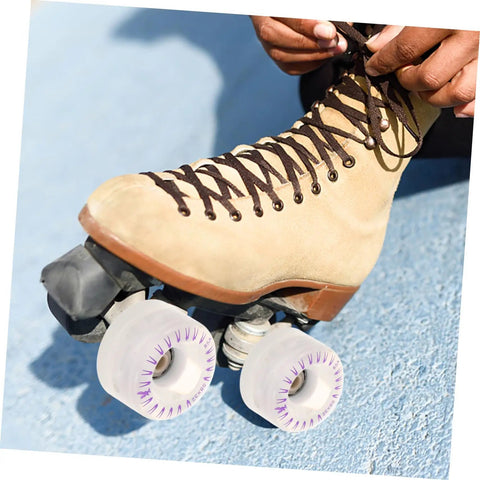 Skater tying laces wearing boots with 2 Pack LED Quad Roller Skate Wheels Light Up Replacement For Indoor Outdoor Skating Smooth Glide