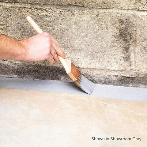 Applying Catalyzed Epoxy Garage Floor Paint Kit, Waterbased Semi Gloss Finish, Showroom Gray, along concrete edge with brush