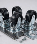 Four Pack Heavy Duty Flat Top Plate Caster Wheels With Dual Swivel And Double Wheel Brakes showing black poly tires on a metal plate.
