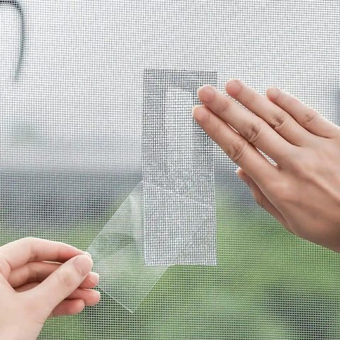 User applying Window And Door Screen Repair Patch Kit With Self Adhesive Tape For Quick Hole Fix Durable Mending Strip For Home Screens