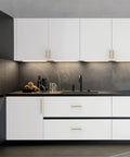 Modern kitchen with white cabinets featuring 10 Pack 5 Inch Champagne Bronze Cabinet Pulls For Kitchen Cabinets And Drawers Premium Champagne Gold Cupboard Hardware