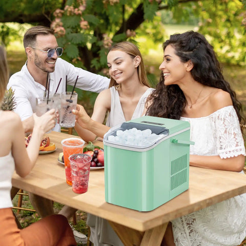 Hella Fast Portable Ice Maker With Built In Handle Makes Twenty Six Pounds Fresh Ice Daily, served at a summer gathering.