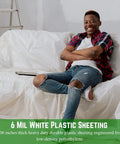 Heavy Duty Pro Grade White Construction Plastic Sheeting 6 Mil Thick Tarp for Dust Containment and Drop Cloth on Sofa