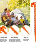Hold It Down Easy 15 Pack Plastic Spiral Tent Stakes 10 Inch Heavy Duty Screw In Sand Anchors Windproof Ground Pegs displayed outdoors