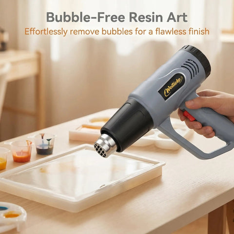 Powerful Dual Temperature Heat Gun With 572F And 1112F Settings Overload Protection Four Nozzles 900 To 1300W Hot Air Tool used for epoxy resin art.