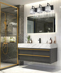 3-light Crystal Black Vanity Light For Bathroom over mirror, matte black fixture with crystal shades, modern bathroom setting
