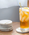 Dope White Marble Coasters Set Of 6 With Gold Brass Inlay For Luxury Aesthetic Modern Coffee Table Decor Real Natural Semi Absorbent Stone Drink Coasters Premium Quality with iced drink on table