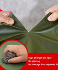 Hands stretching green High Rise Cargo Chute For Fast Warehouse Unloading And Loading Tarpaulin Slide Conveyor Made From Heavy Duty Polyester With Steel Ring Reinforcement Green Chute