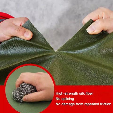 Hands stretching green High Rise Cargo Chute For Fast Warehouse Unloading And Loading Tarpaulin Slide Conveyor Made From Heavy Duty Polyester With Steel Ring Reinforcement Green Chute