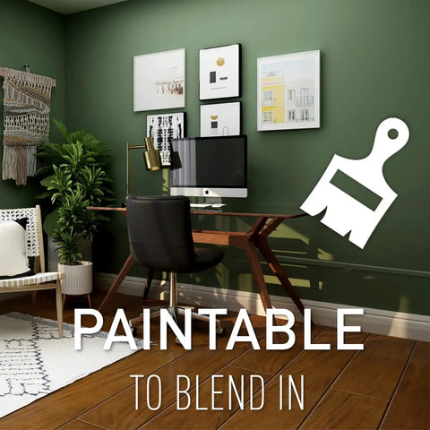 CordMate II Cable Management Kit in a home office with green walls, showcasing its paintable feature to blend with decor, CMK50