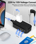 Image of 2300W Travel Voltage Converter With 220V To 110V Step Down 3 USB Ports 1 Type C And 3 AC Outlets connected to devices