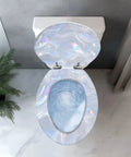 Elongated Resin Toilet Seat for Bathroom, overhead view showing a pearlescent design, fitting most standard toilets.