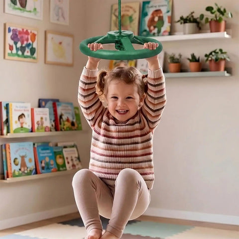 Child playing with Twister Swing Spins Set With 360 Degree Steering Wheel Design Slackline Attachments in a playroom