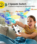 Girl playing with Kid Friendly Indoor Quadcopter With 2 Modular Batteries 360 Degree Flips Auto Hover 3 Speed Modes LED Lights Easy One Key Takeoff