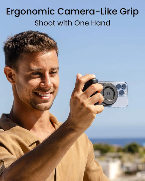 Man using Magnetic Phone Stand Camera Grip With Wireless Charging And Bluetooth Shutter For iPhone, ergonomic grip outdoors.