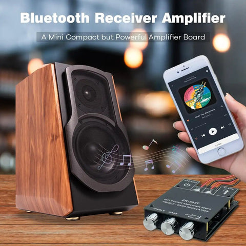 Bluetooth 5.0 Amplifier Board with Bass and Treble Control next to wooden speaker and smartphone in use