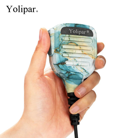 Person holding a Shoulder Speaker Microphone With 3.5mm Jack For Motorola Radios Handheld Mic Compatible With CP100D CP185 CP200 CP200D R2