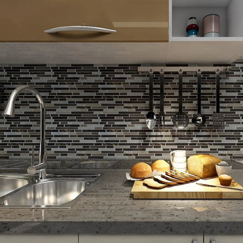 Self Adhesive Peel And Stick 12x12 Inch Wall Tiles, 10 Tiles, Shiny Backsplash in kitchen over marble countertop.
