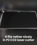 Dofiki steel honeycomb cutting bed for P2/P2S CO2 laser cutter; front view shows hexagonal grid.
