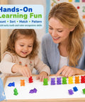 Awesome Rainbow Counting Bears Set Of 100 Bright Plastic Sorting Toys For Toddlers on tray with child and adult.