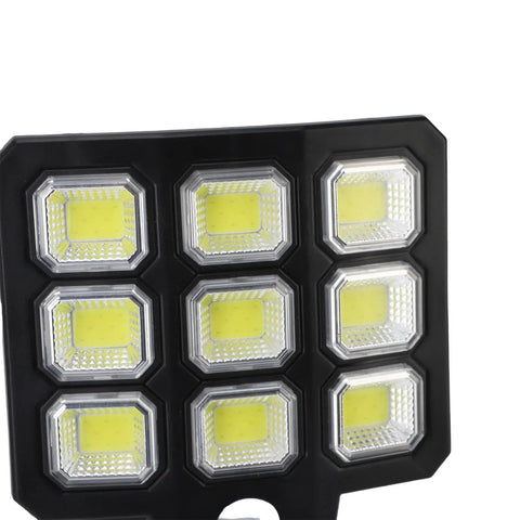 Eminchu Solar Flood Light for Patio Yard, 240 LED featuring 240 bright LEDs arranged in a compact black housing.