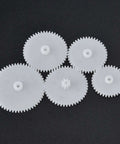 White plastic gears from 75-Piece Motor Gears Kit With Belt Pulley Shaft Sleeve And Plastic Set For DIY Robot Gearbox Projects
