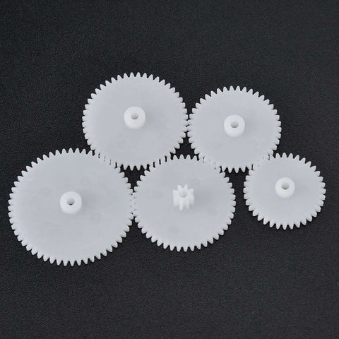 White plastic gears from 75-Piece Motor Gears Kit With Belt Pulley Shaft Sleeve And Plastic Set For DIY Robot Gearbox Projects