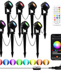 Set of 8 Pack Smart RGBW Outdoor Landscape Lights With IP65 Waterproof, Low Voltage, App And Remote Control displayed with remote.