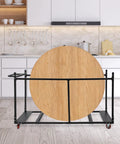 Heavy Duty Folding Table Cart For Easy Transport And Storage Hauls Up To 10 Tables With Locking Casters, Smooth Rolling, Ideal For Banquet Halls, Schools, And Events, Durable On The Go Mobile Solution For Staff, black metal cart holding a round folding table