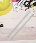 Heavy Duty Coil Pipe Bender Kit For Copper And Steel Tubes with strong steel spring tools on a workbench.