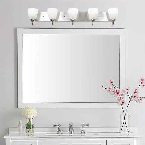 Armada 36 Inch Five Light Modern Vanity Light With Brushed Nickel Finish And Frosted Glass Shades for Bathroom shown above mirror