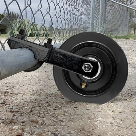 Beefed Up Heavy Duty Farm Gate Wheel 6 Inch By 2 Inch Rubber 1200 Lb Capacity Heat Resistant Multi Surface Plate Mount Gate Roller Fits One And Three Eighths Inch To Two And One Eighth Inch Pipe Built For Tough Outdoor Gates attached to metal gate on gravel