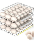 54 Egg Rolling Organizer for Refrigerator with 3 Layers, Clear Egg Storage Box with Lid, showing stacked layers filled with eggs.